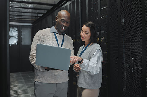 business-black-man-and-woman-with-laptop-servers-2023-03-01-20-57-21-utc.jpg